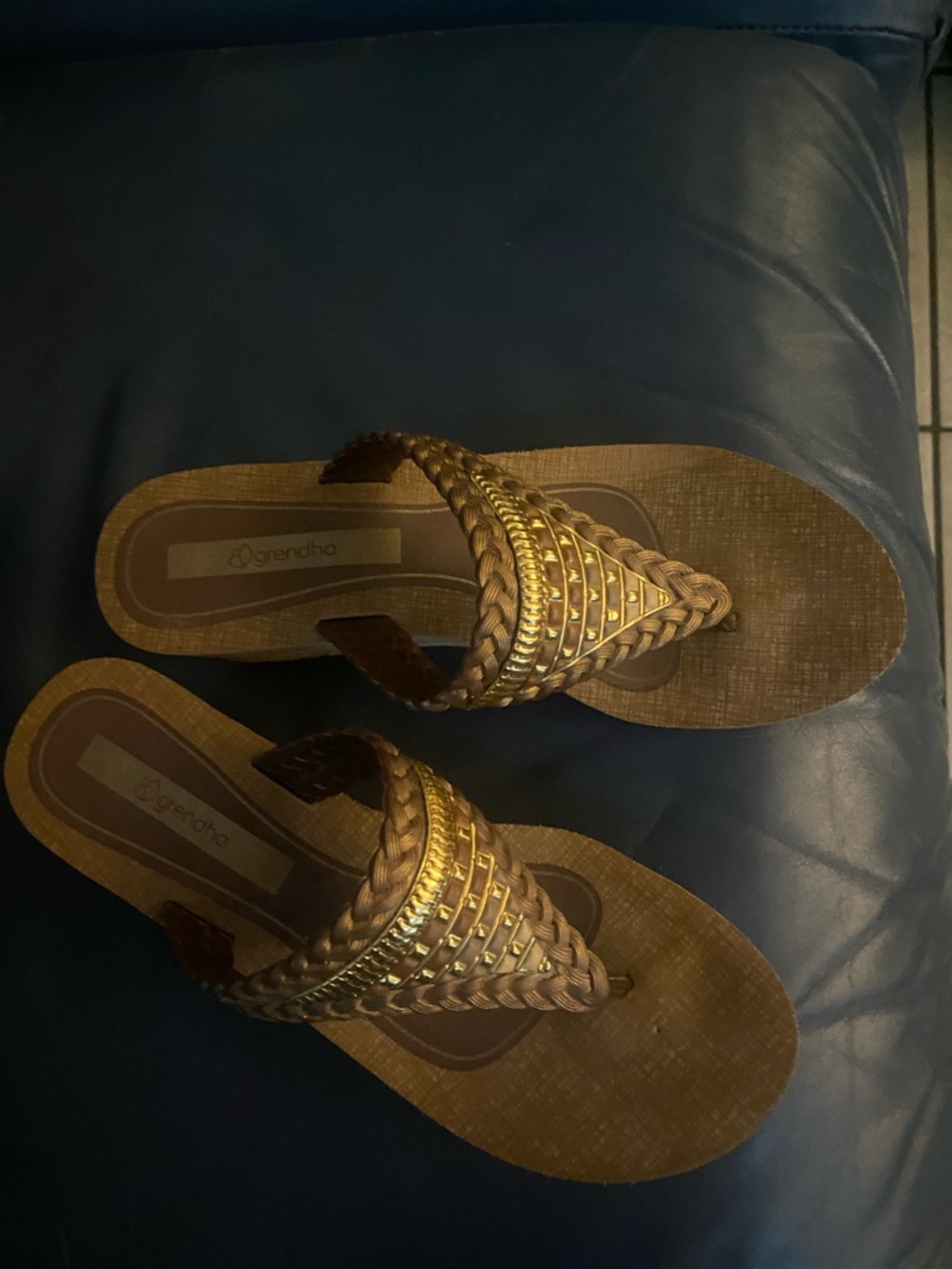 Woven Brown Thong Sandals with Metallic Trim
very good condition. 
cushioned